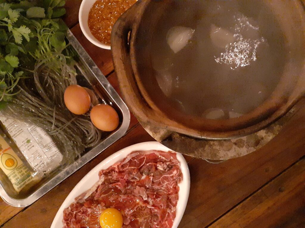 Hot pot set: 80,000 kip in Hop Land (Hotpot Restaurant) in Oudomxay (Muang Xay)