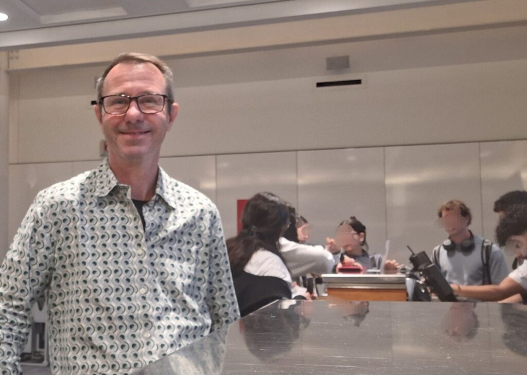 Behind me, there are four girls volunteering changing their flights at the gate of air Canada in Montreal airport 