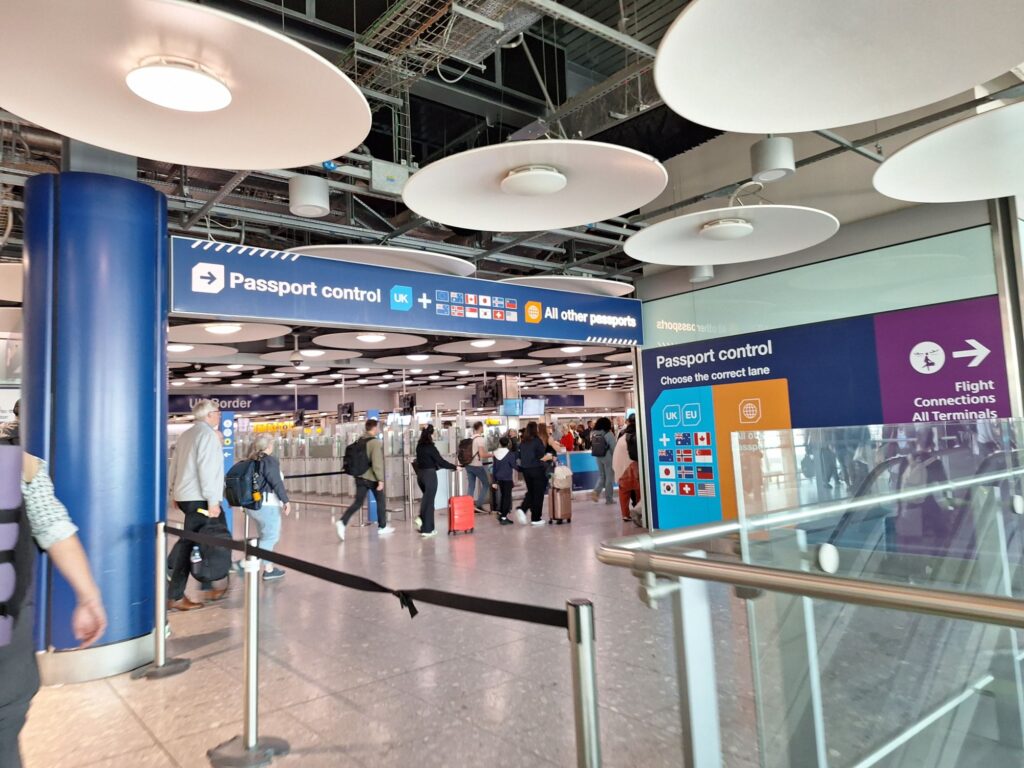 Immigration sign for different nationalities at Heathrow airport 