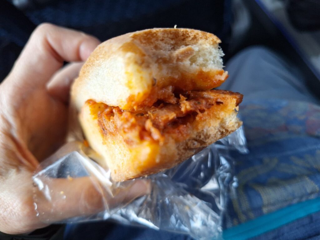 Chicken and cheese sandwich served as pre arrival breakfast on board by British airways 