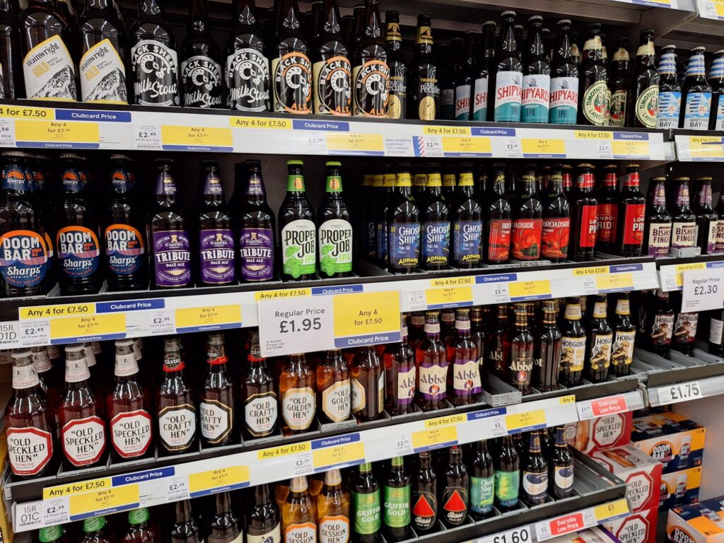 Beer section in Tesco, normal price is £1.95/bottle, but any 4 for £7.5