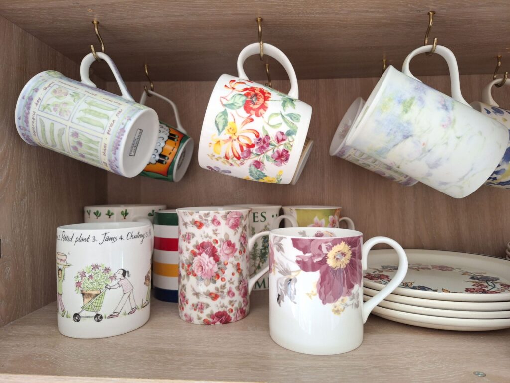 Tea cups in the cupboard in England