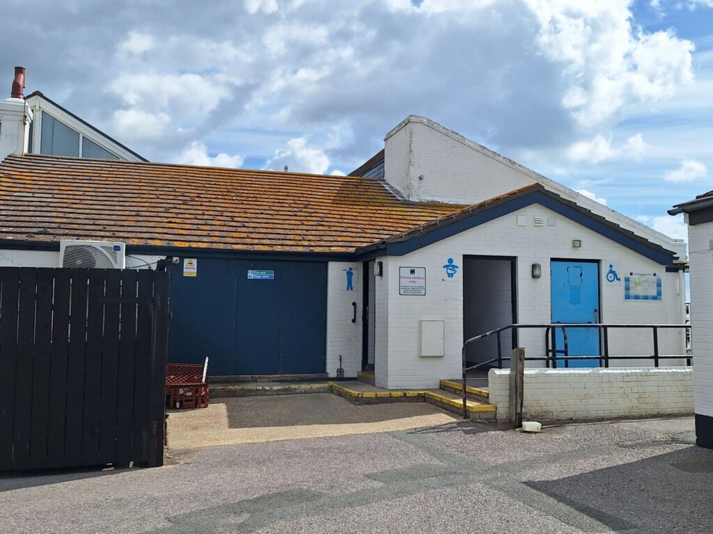 Toilets behind the Haven House Inn