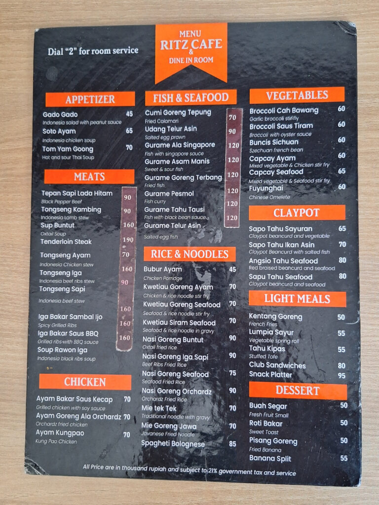 Food menu in the room in Orchardz Hotel Bandara