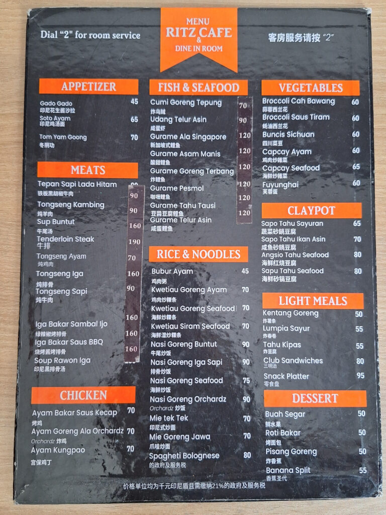Food menu in the room in Orchardz Hotel Bandara