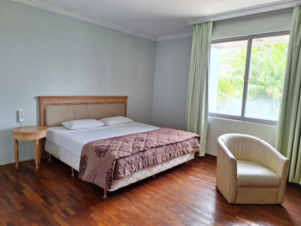 A double room in Nirmala Beach Hotel and Resort
