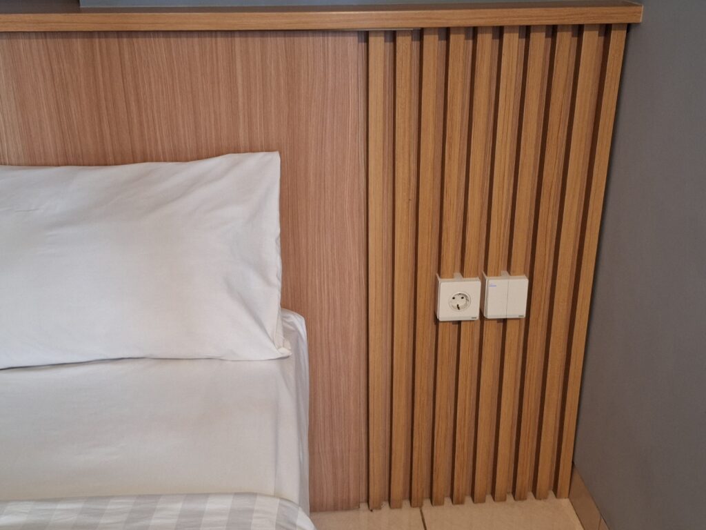 There is only one socket by the bed in Studio One Thamrin Hotel