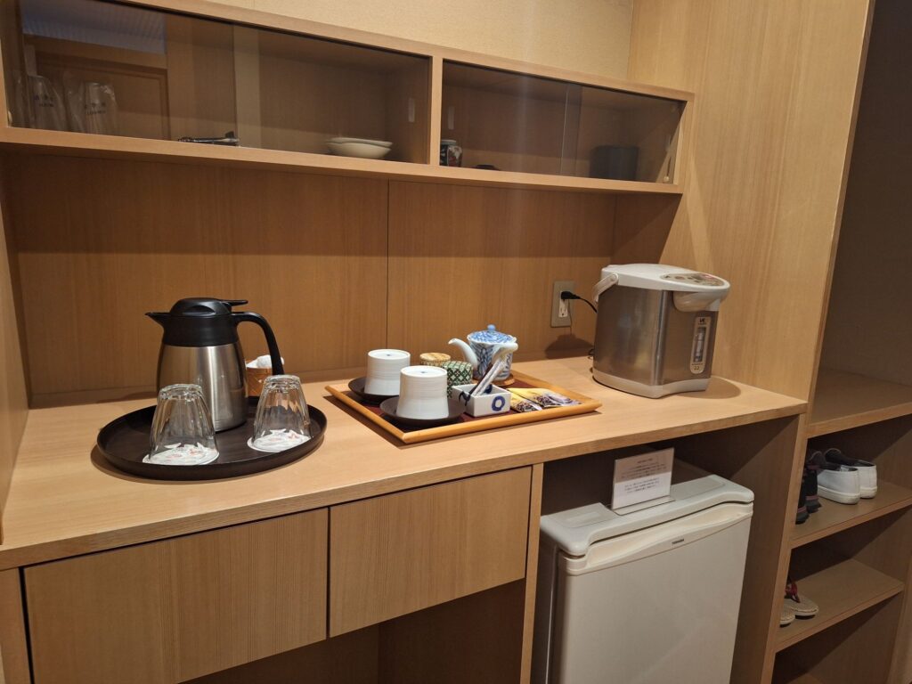 Tea set and fridge, electric kettle in the Japanese Ryokan room