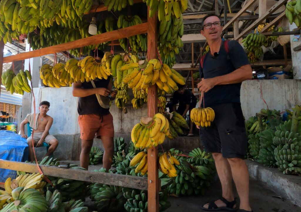 Buying bananas in Naikoten Traditional Market